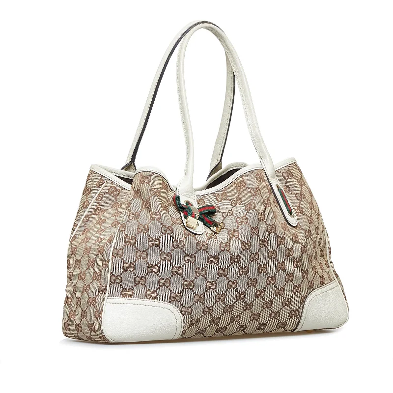 Women Gucci Sylvie bags with a monogram - embossed leatherGucci GG Canvas Princy Tote (SHG-wfGuxY)