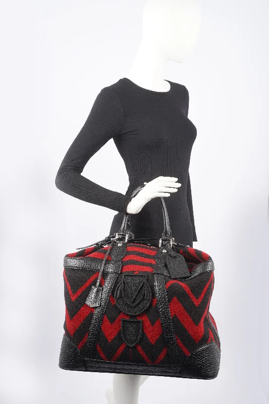 Louis Vuitton Alma bags with a monogram - embossed leather surfaceLouis Vuitton Womens Grimaud Vail Blanket Weekend Bag Black Red