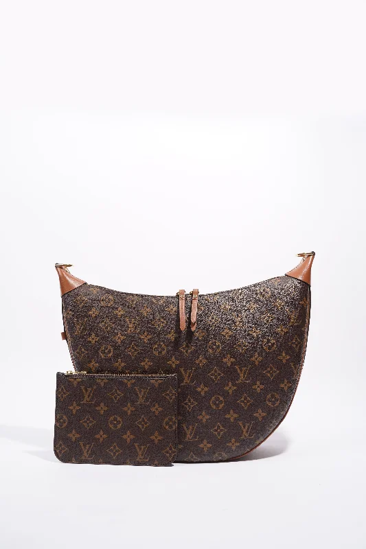 Louis Vuitton Twist bags with a contrast - colored interior for visual interestLouis Vuitton Womens Loop Hobo Bag Monogram