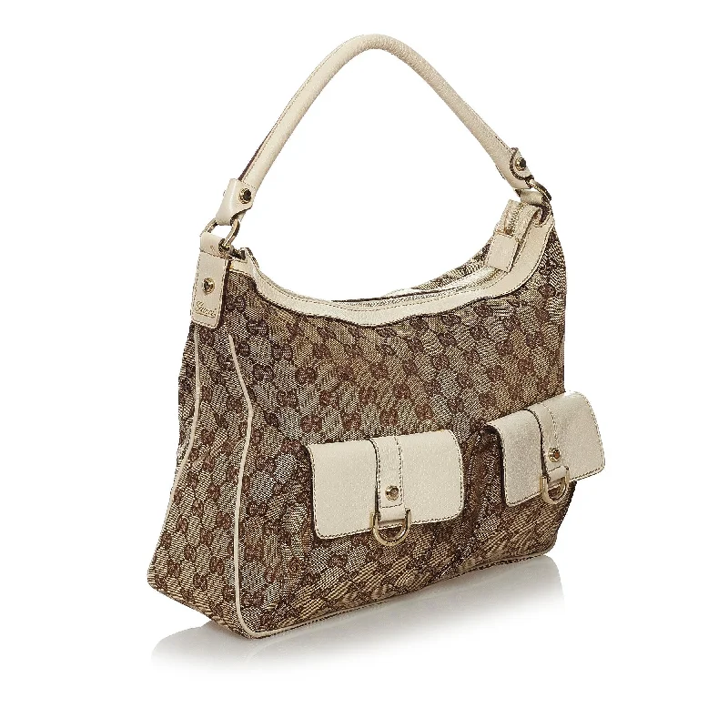 Ladies Gucci shoulder bags with a tassel decorationGucci GG Canvas Abbey Shoulder Bag (32008)