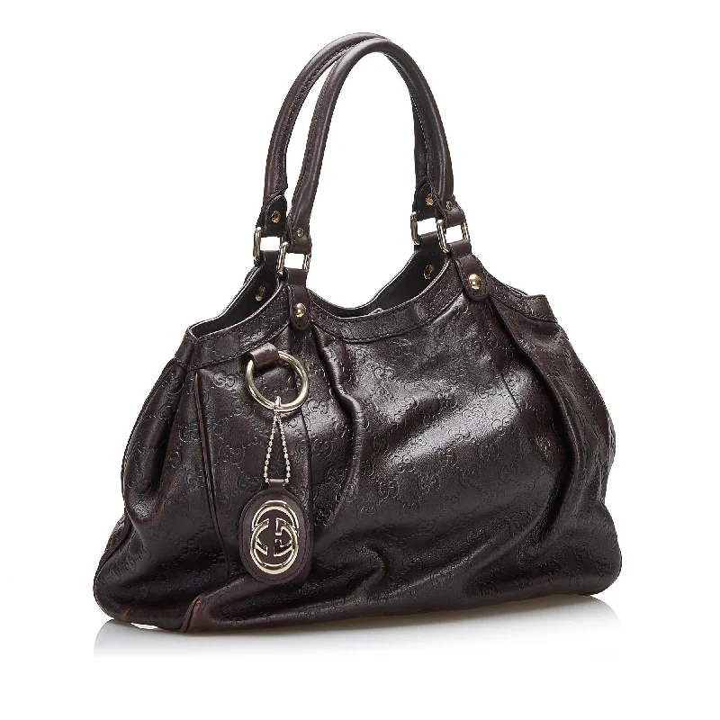 Women Gucci bags with a snap - button closure and a decorative charmGucci Guccissima Sukey (SHG-Crr7vF)