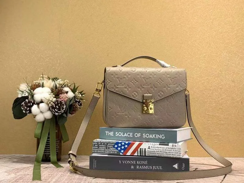 Ladies Louis Vuitton Petite Malle bags in a pastel color for a soft lookThe Franco Shops - Louis Vuittons  - 12092