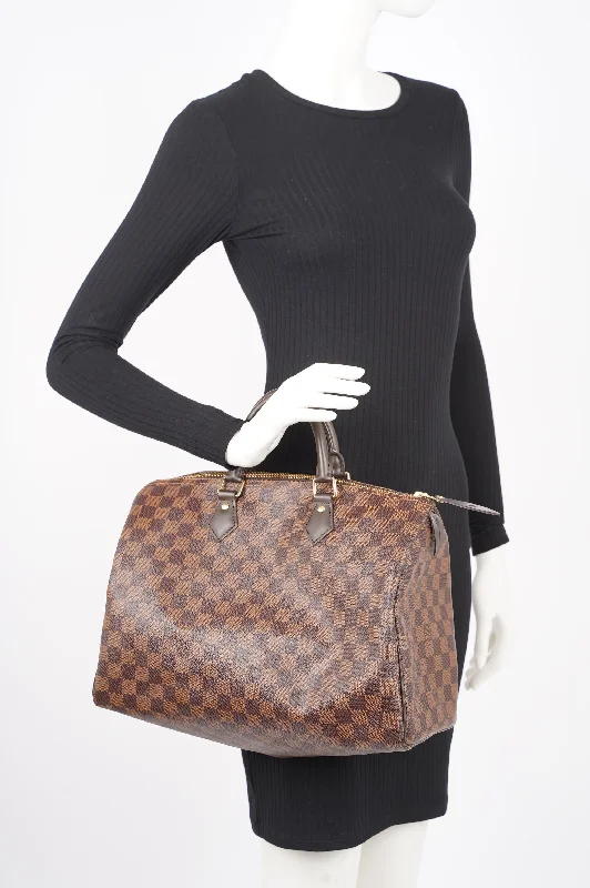 Ladies Louis Vuitton Capucines bags with a detachable shoulder strapLouis Vuitton Womens Speedy Damier Ebene 35