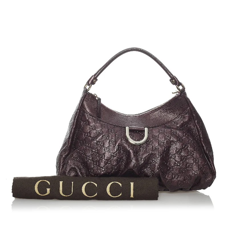 Women Gucci bags with interlocking G hardware for a classic lookGuccissima Abbey D-Ring Shoulder Bag