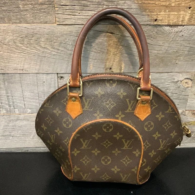 Louis Vuitton Alma bags featuring the signature top - handle designLouis Vuitton Monogram Ellipse Bag