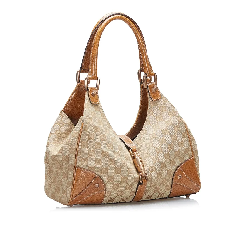 Women Gucci bags with a snap - button closure and a decorative charmGucci GG Canvas Nailhead Jackie Bardot (SHG-LGilwa)