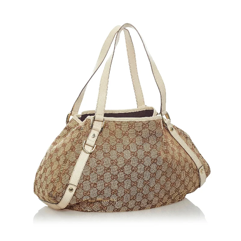 Women Gucci Sylvie bags with a monogram - embossed leatherGucci GG Canvas Abbey Shoulder Bag (32064)