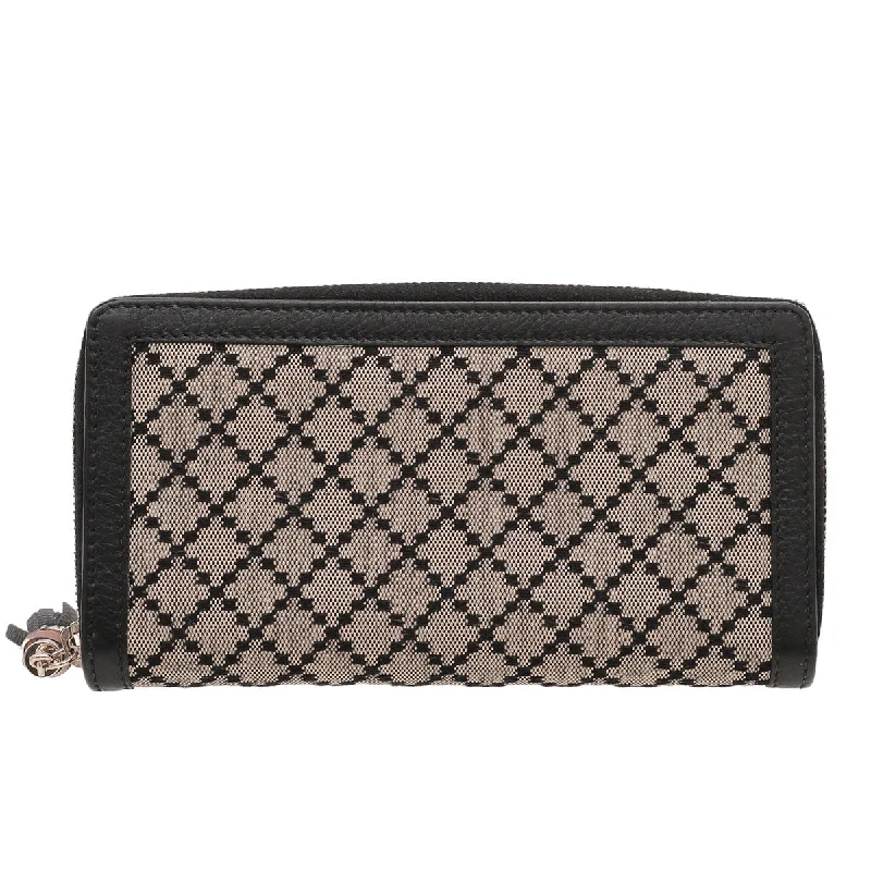 Gucci Marmont bags for women with a snakeskin - effect panelGucci Bicolor Diamante Bamboo Tassel Zippy Wallet