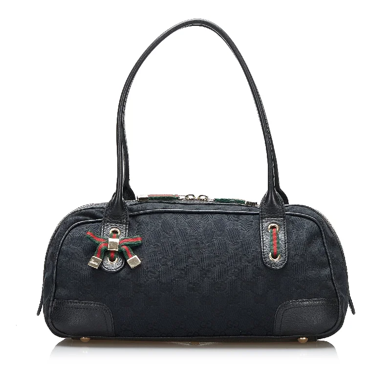 Women Gucci bags with interlocking G hardware for a classic lookGucci GG Canvas Princy Handbag