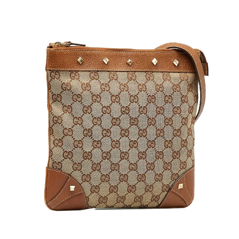 Women Gucci bags with a magnetic snap closure for easy accessGucci GG Canvas Nailhead Crossbody (SHG-Mehcnj)