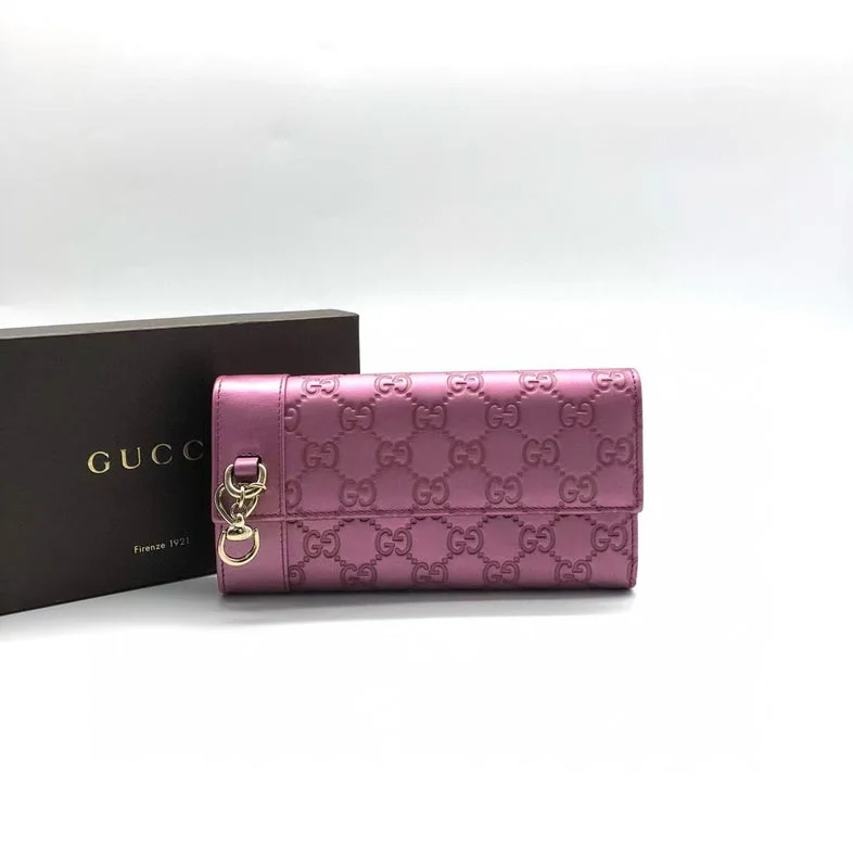 Gucci Marmont bags for women with a snakeskin - effect panelGucci Pink Embossed Leather Wallet