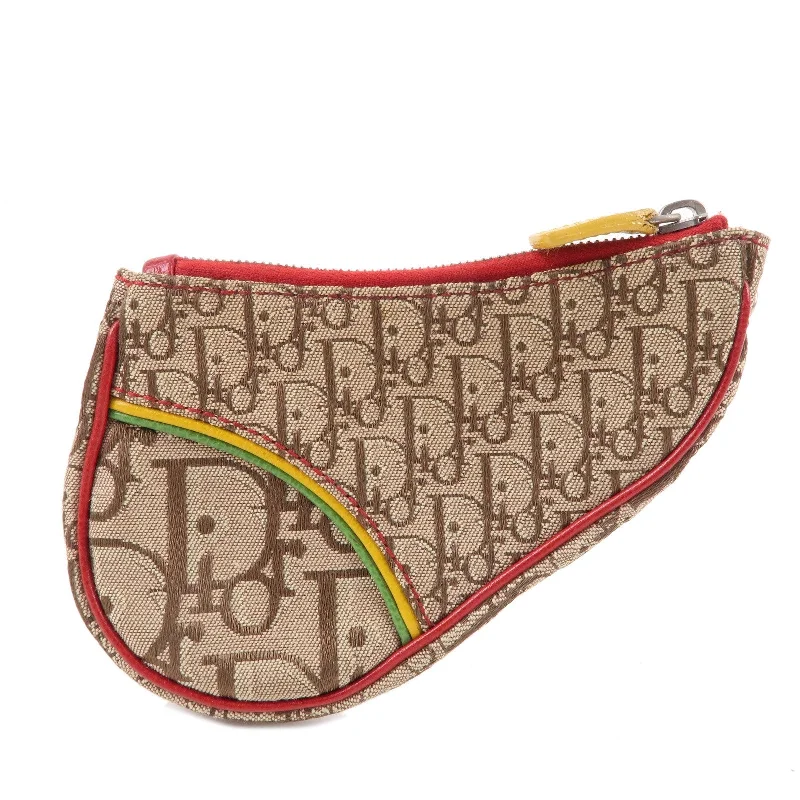 Trendsetting Christian Dior crossbody bags with a colorful strapChristian Dior Rasta Trotter Canvas Leather Saddle Coin Case