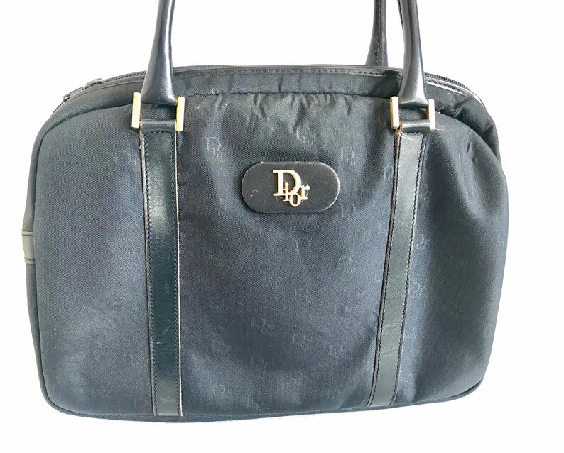 Christian Dior handbags with a back - pocket for quick storageCHRISTIAN DIOR Vintage navy handbag with logo jacquard nylon and leather trimmings