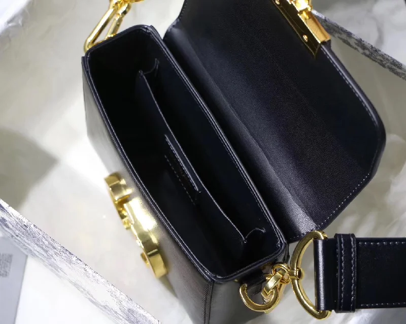 Christian Dior handbags with a snap - button closure and a decorative buckleDior 30 Montaigne Box Bag In Black Lambskin