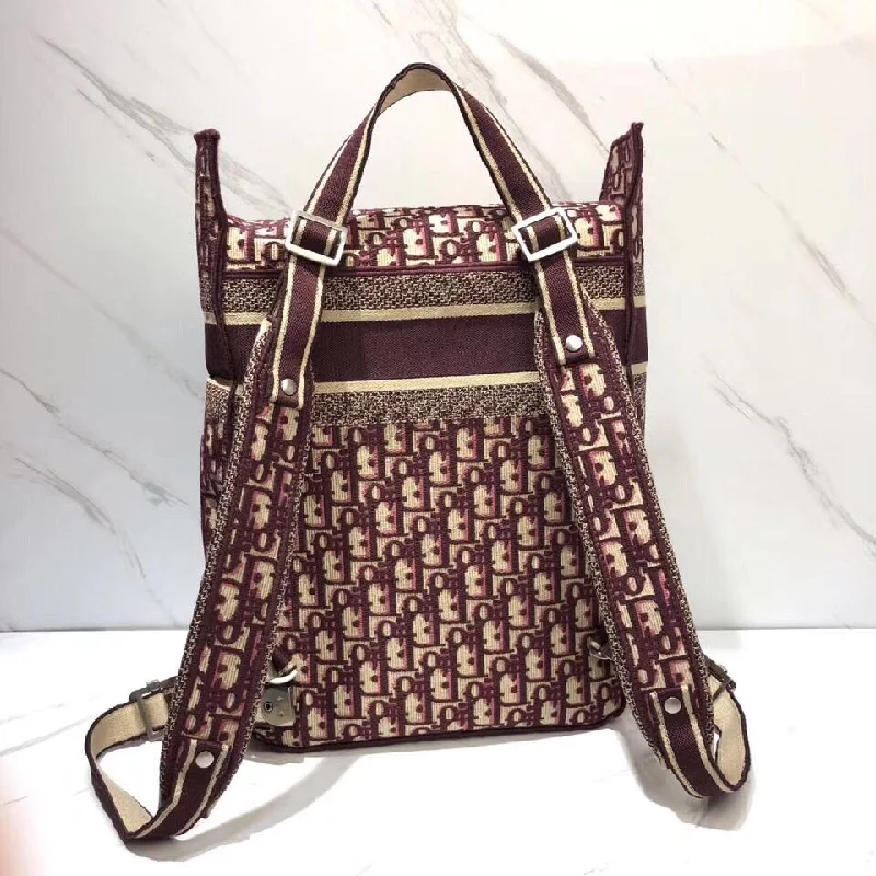 Christian Dior bags with a zip - top closure and multiple compartmentsDior Backpack In Burgundy Oblique Embroidered Canvas