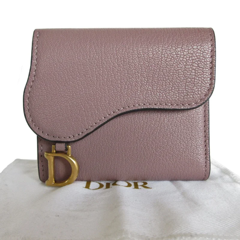 Christian Dior bags with a side - pocket for holding a water bottleDior Saddle Wallet